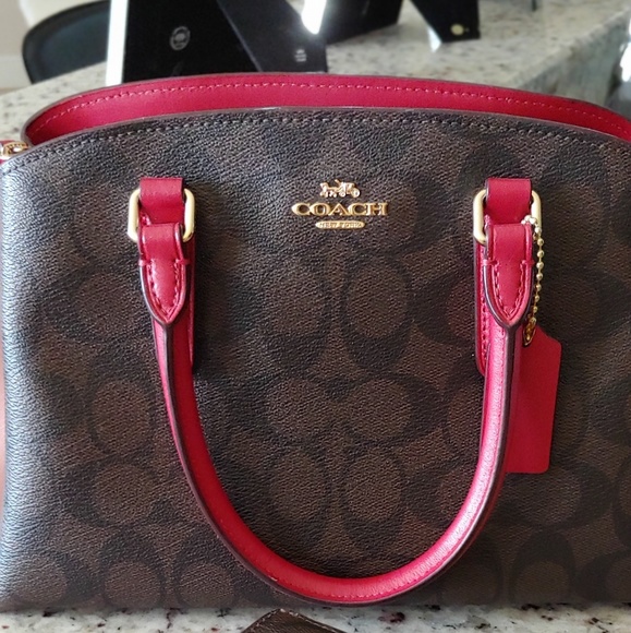 Coach Handbags - Coach purse with matching wallet. Coach Handbags - Coach purse with matching wallet.